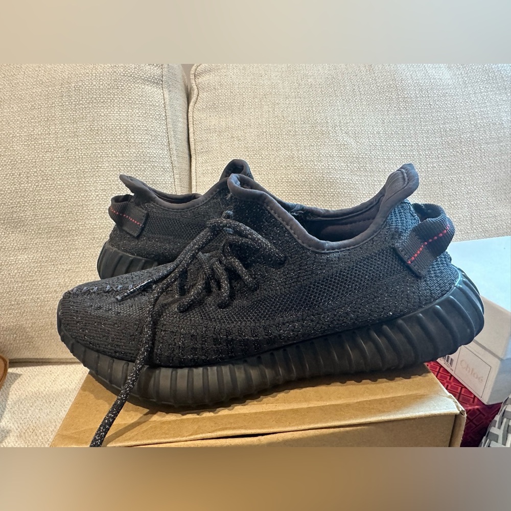 Black reflective Yeezys